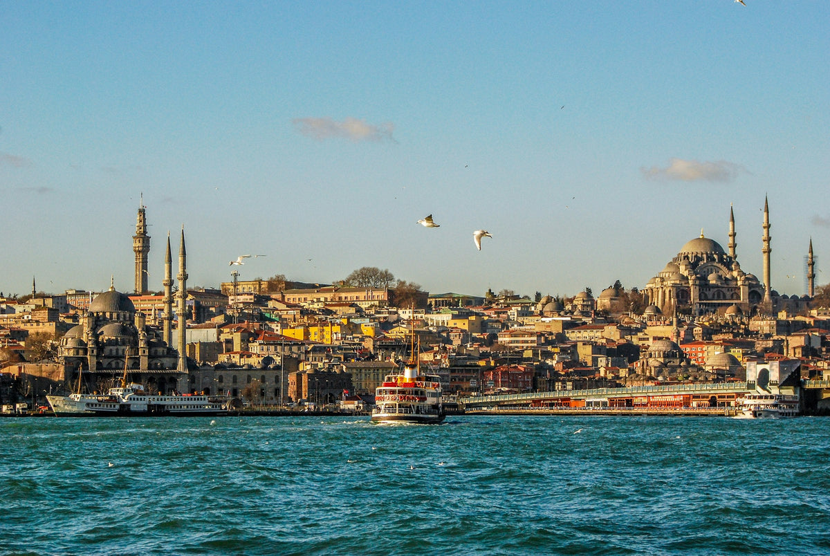 Ferry crossing the Bosphorus with the Eminönü skyline of Istanbul